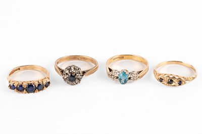 Lot 281 - Four yellow metal gem set rings