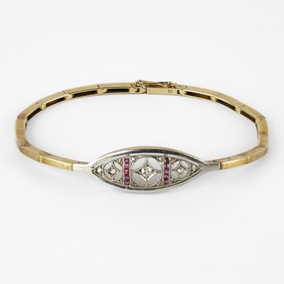 Lot 286 - An Edwardian diamond and ruby bracelet
