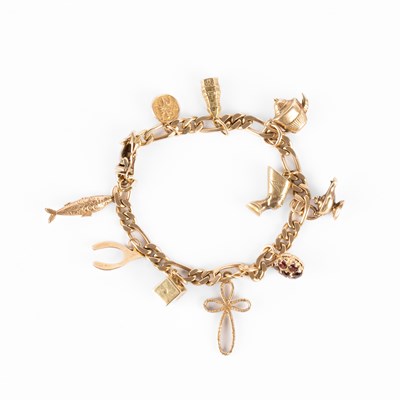Lot 291 - A yellow metal charm bracelet