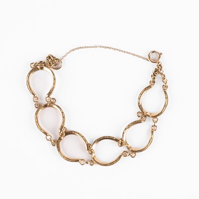 Lot 292 - Equestrian interest - A 9ct yellow gold bracelet