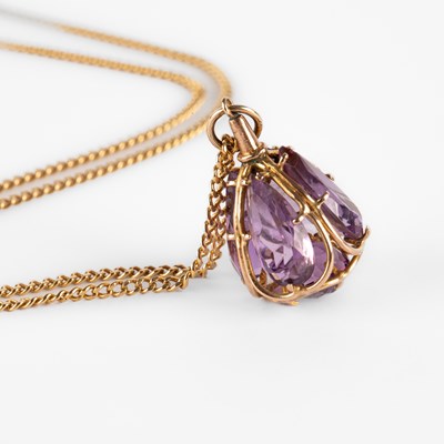 Lot 297 - A yellow metal and amethyst pendant necklace