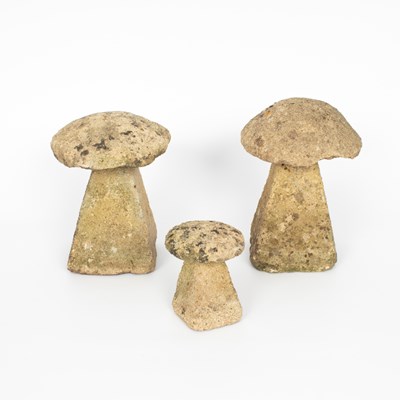 Lot 860 - A set of three miniature staddle stones