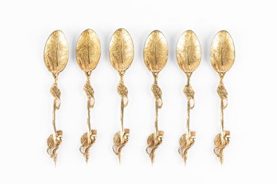 Lot 145 - A set of twelve 18th Century style cast gilt-metal teaspoons