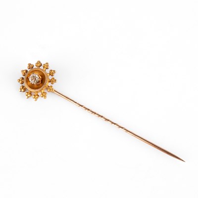 Lot 346 - A Victorian yellow metal and diamond set stick pin