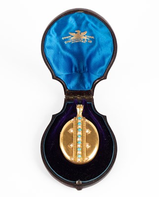 Lot 75 - A Victorian turquoise and seed pearl set locket