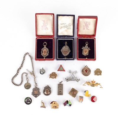 Lot 90 - Three silver prize medallions by J A Wyllie & Co