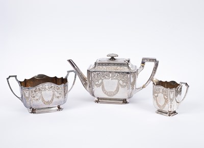 Lot 37 - A Victorian three-piece silver and silver-gilt tea set