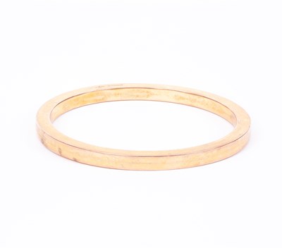 Lot 64 - A 9ct gold hollow bangle