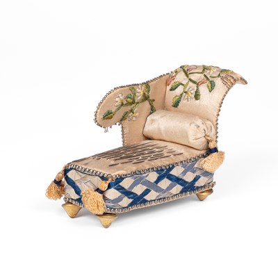 Lot A pincushion in the form of a chaise longue