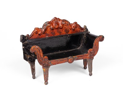 Lot 442 - An Evans & Cartwright dolls' house sofa