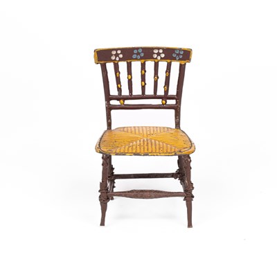 Lot 446 - An English cast pewter dolls' house chair