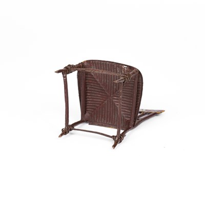 Lot 446 - An English cast pewter dolls' house chair