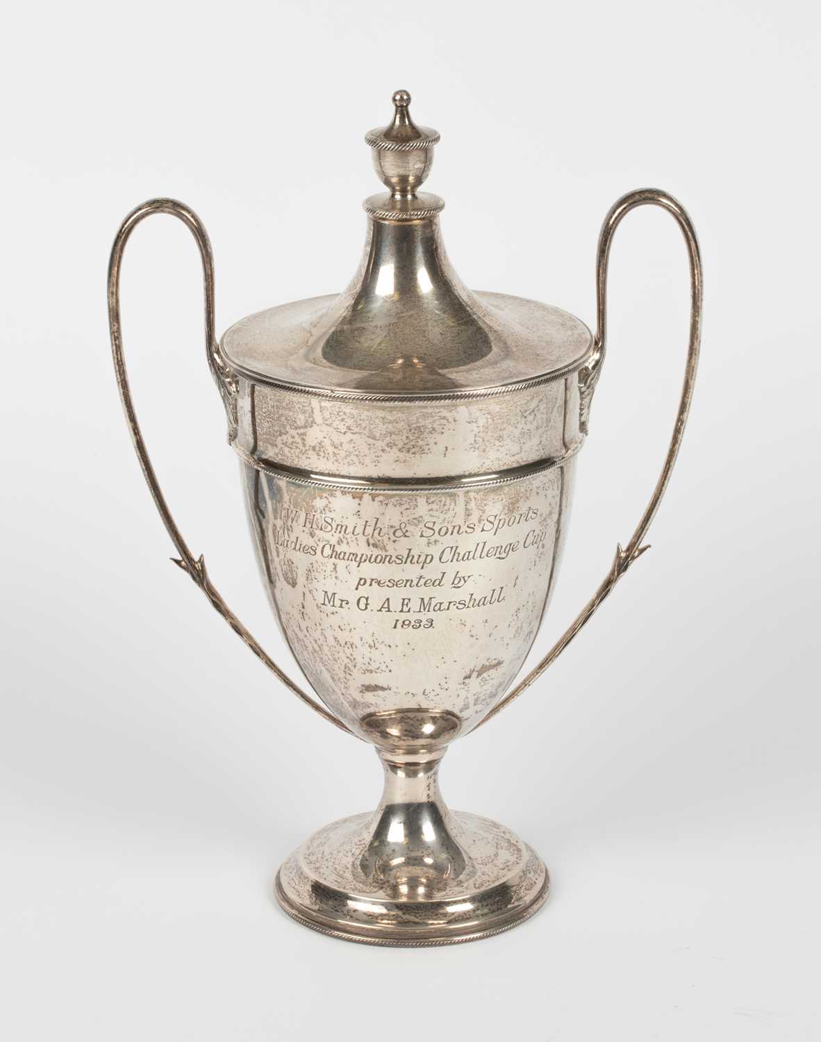Lot 12 - A silver trophy cup and cover