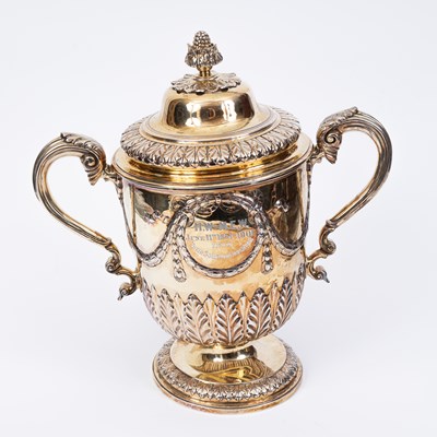 Lot 15 - A George IV silver gilt twin-handled cup and cover