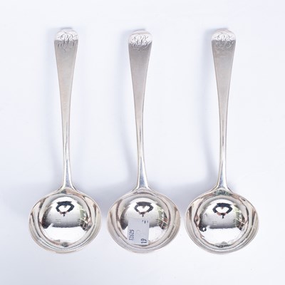 Lot 19 - A set of three George III Britannia standard silver sauce ladles