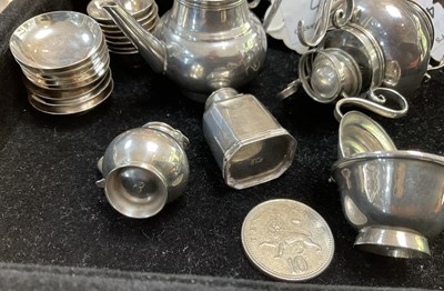 Lot 406 - A matched 18th Century miniature silver tea service