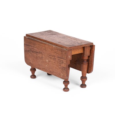 Lot 463 - A rare English wooden dolls' house gateleg table