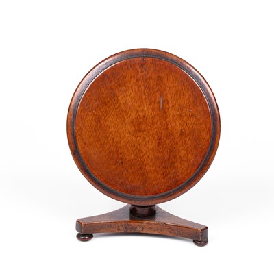 Lot 464 - An English mahogany dolls' house tiptop table