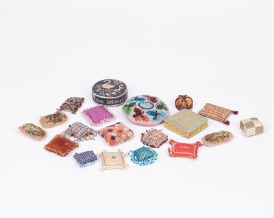 Lot 477 - A collection of sixteen small pincushions
