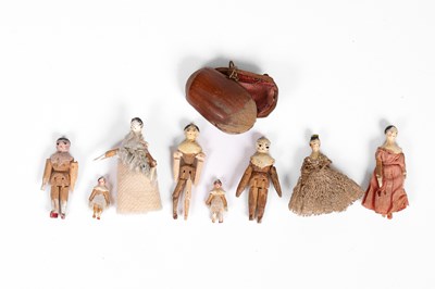 Lot 502 - Eight tiny Grodnertal dolls