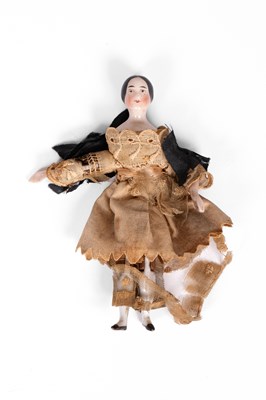 Lot 506 - A German porcelain dolls' house doll