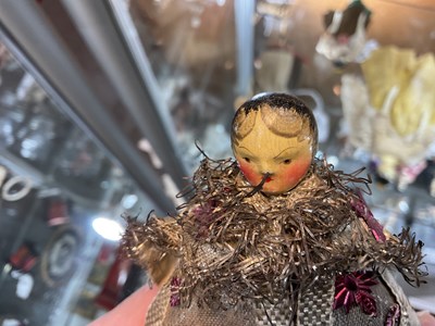 Lot 509 - An unusual Oberammergau or Grodnertal wooden dolls' house doll