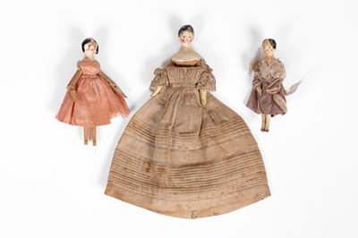 Lot 510 - Three Grodnertal dolls' house dolls