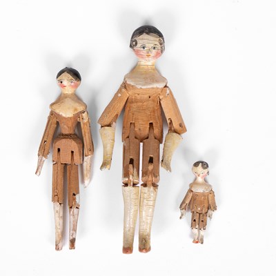 Lot 518 - Three Grodnertal dolls' house dolls