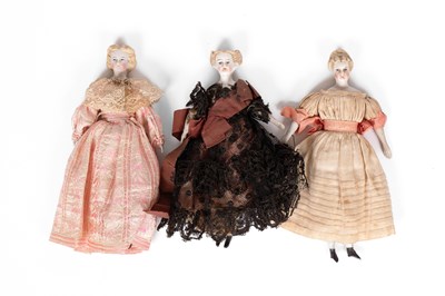 Lot 528 - Three German bisque dolls’ house dolls