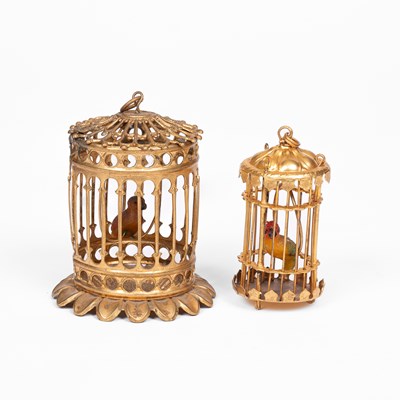 Lot 557 - Two Erhard dolls' house birdcages