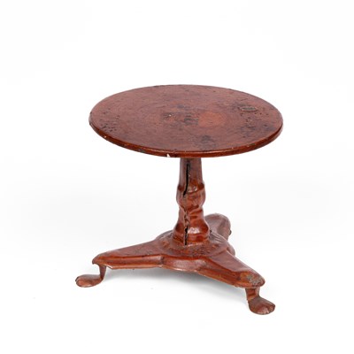 Lot 568 - An Evans and Cartwright round dolls' house table