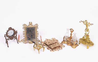 Lot 619 - A group of German soft metal dolls' house pieces