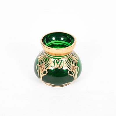Lot 444 - An Art Nouveau green glass and gilt overlay vase