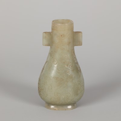 Lot 250 - A Ming style celadon jade 'crane' arrow vase