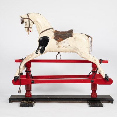 Lot 777 - A Victorian white painted wooden rocking horse