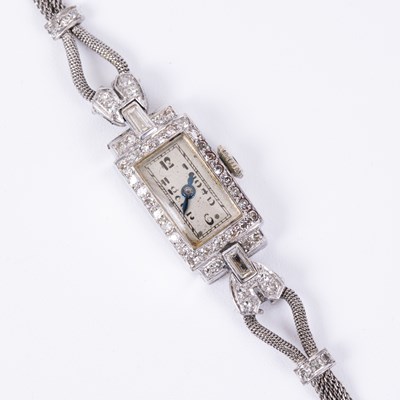 Lot 139 - A lady's platinum diamond set cocktail watch