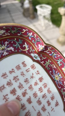 Lot 212 - A Chinese famille rose ruby ground imperially inscribed quadrilobed tray