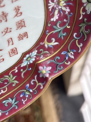 Lot 212 - A Chinese famille rose ruby ground imperially inscribed quadrilobed tray