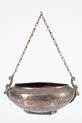 Lot 236 - An Islamic copper Kashkul/beggar's bowl