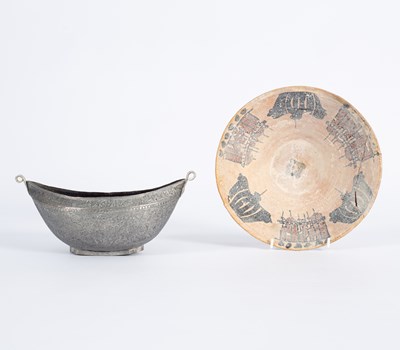 Lot 237 - An Islamic copper Kashkul/beggar's bowl