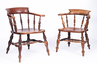 Lot 734 - A pair of late 19th Century tub-shaped spindle back armchairs