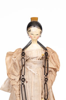 Lot 604 - A fine Grodnertal doll