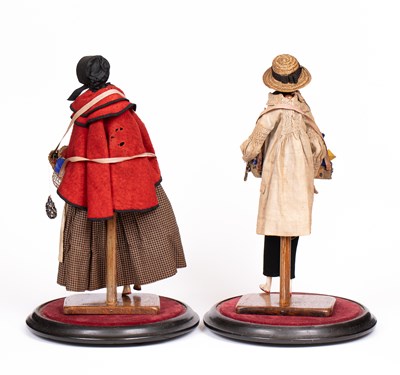 Lot A fine pair of large Grodnertal pedlar dolls