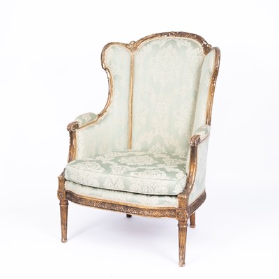 Lot 760 - A Louis XVI style gilt bergere armchair
