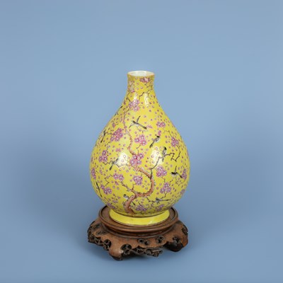 Lot 255 - A Chinese yellow-ground famille rose magpie and prunus vase