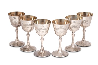 Lot 125 - A set of six silver County Cricket Champion commemorative goblets