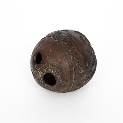 Lot 858 - An early 19th Century sailor’s carved bugbear coconut