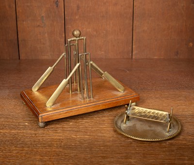 Lot 138 - A mahogany and brass mounted novelty cricket letter rack