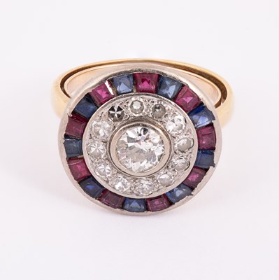 Lot 100 - An Art Deco style 18ct yellow gold diamond, ruby and sapphire target ring
