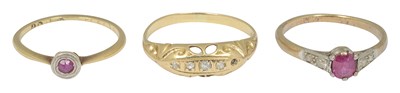 Lot 638 - Three yellow metal gem set rings